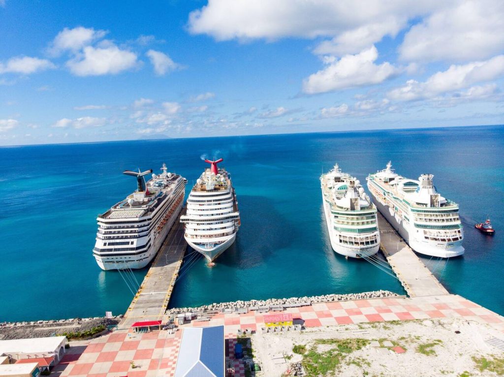 Cruise ships docked in Philipsburg, St. Maarten, ready for Caribbean voyages booked through Lets-Cruise.sx.